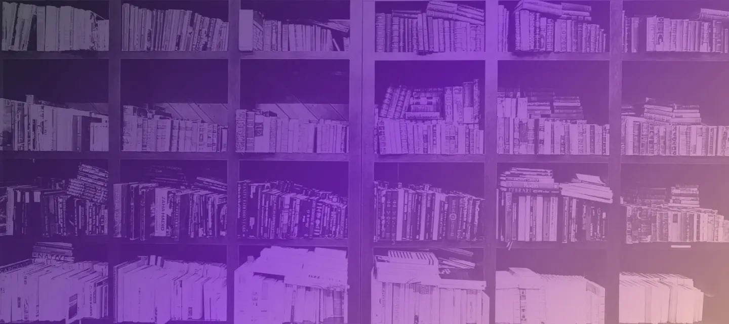 Photograph with books stacked on bookshelf with a purple filter
