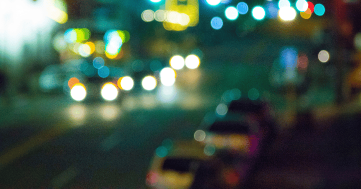 Photo of a city street at night