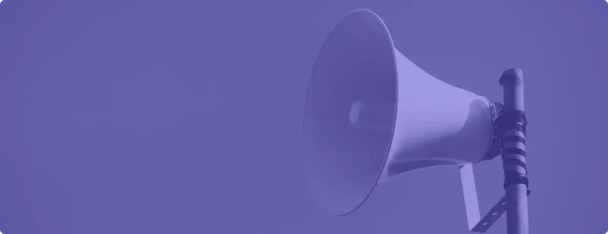 Photograph of a megaphone with purple filter