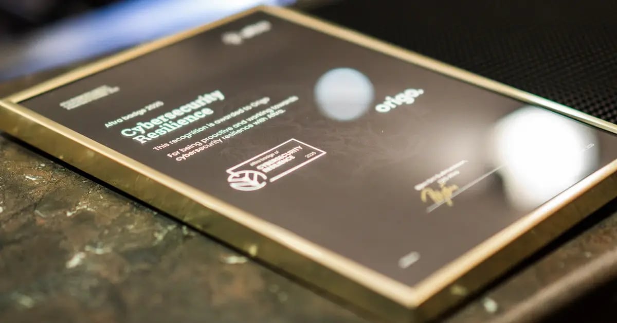 Up close photograph of the Aftra badge framed