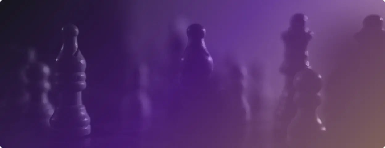 Up close photo of a chessboard with a purple gradient filter