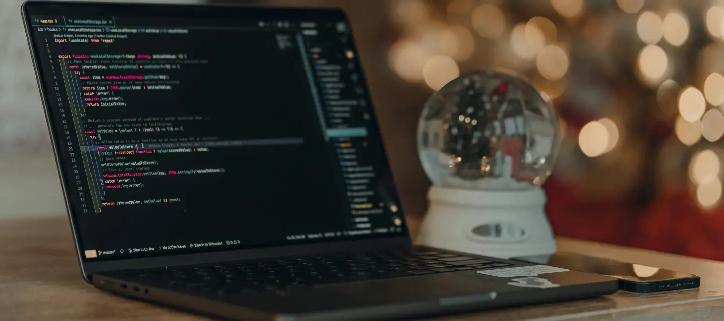 Laptop and snowglobe
